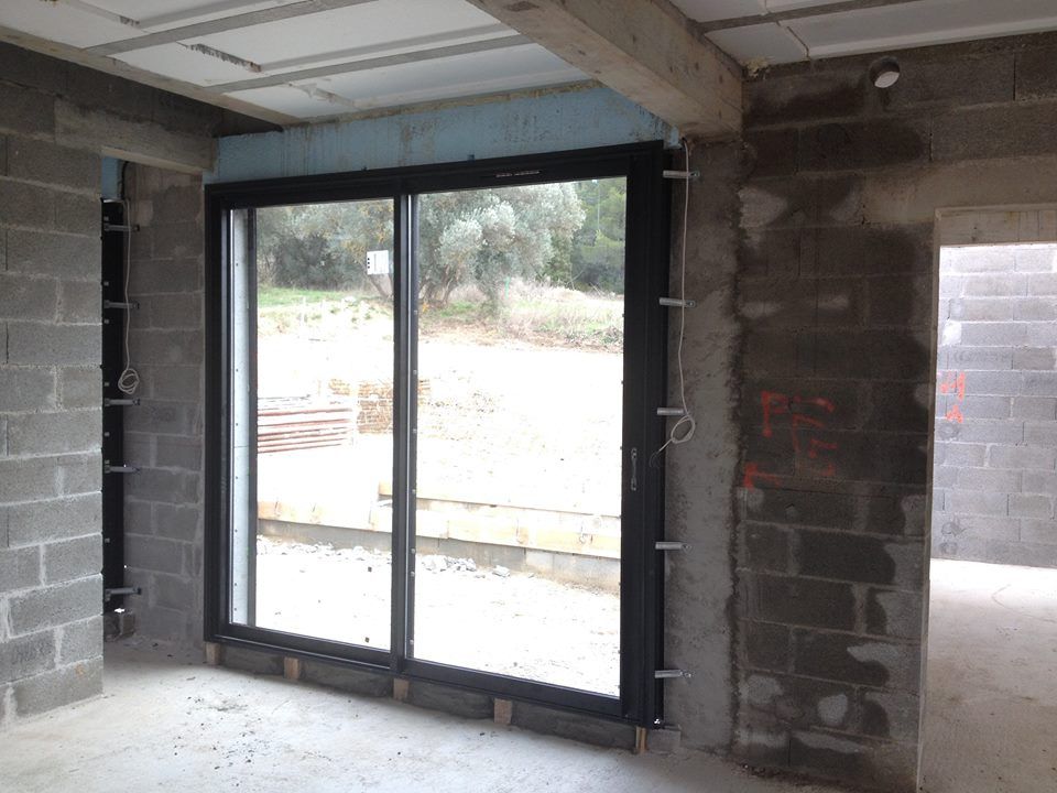 Châssis coulissant 2 vantaux posé en neuf par Alberstore à Aix en Provence